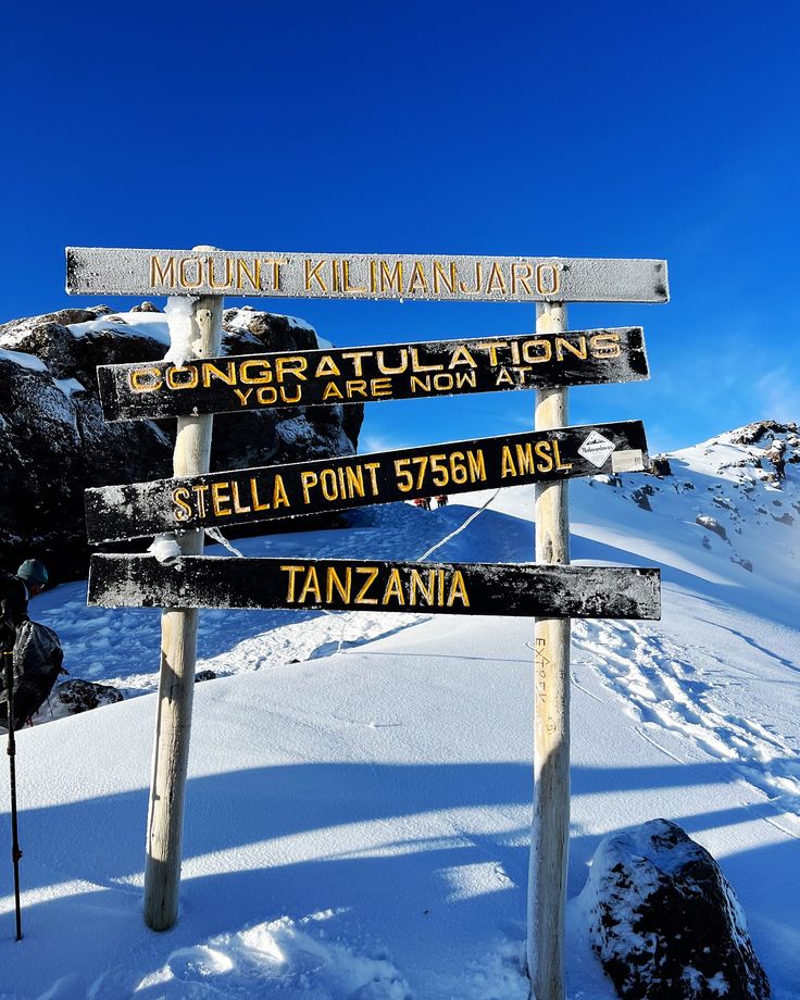 Climbers hiking rocky trail Mount Kilimanjaro Tanzania